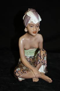 Dahl Jensen Bali Woman w/Turban #1136: Dahl Jensen Copenhagen porcelain figurine of Balinese Woman With Turban, #1136. 8.5"h. Post-1928 date stamp. No damage