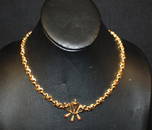 71: 18kt Gold "X" Link Necklace w/Stones