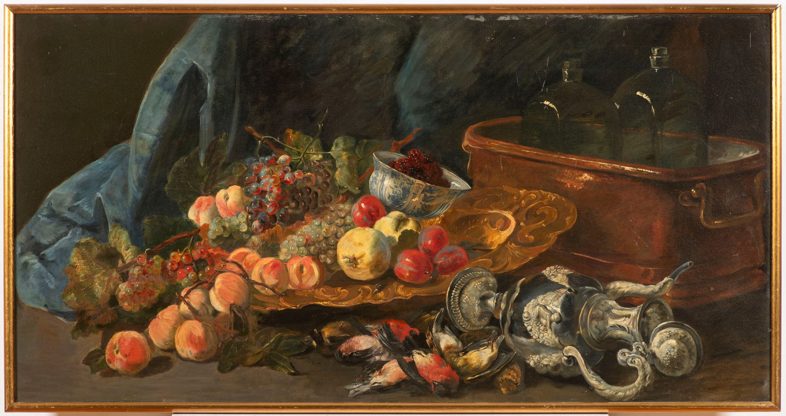 After Willem van Aelst (1627-1683): Large still life with fruits, birds and silver objects by a water cooler basin with two glass flasks and some berries in a Wang-Li bowl; in the background blue curtain before brown colours. Dimensions
