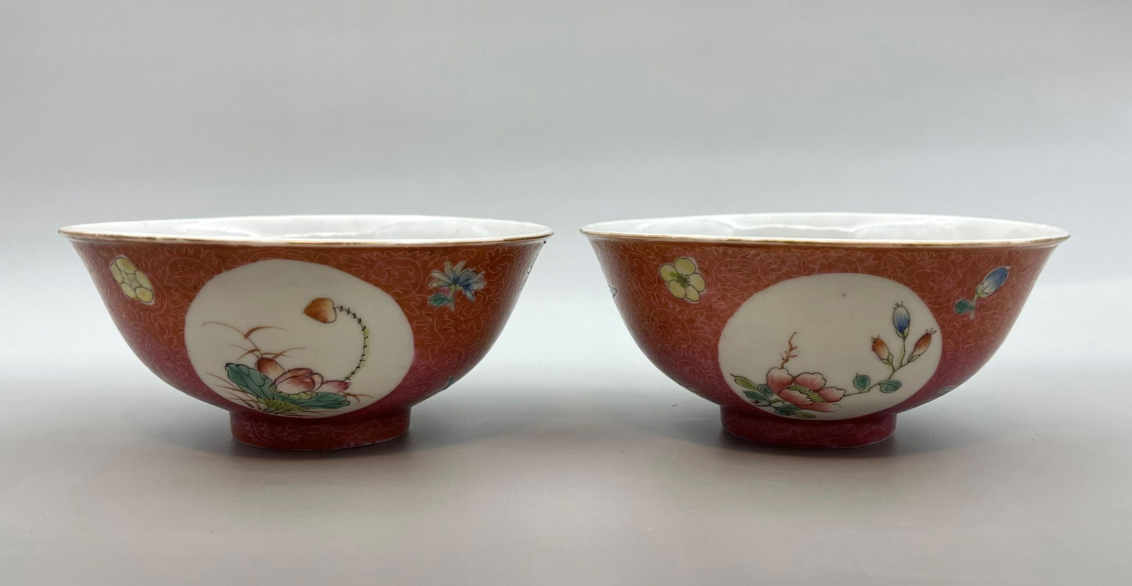 A PAIR OF CHINESE RUBY SGRAFFIATO GROUND BOWLS (1 of 4)