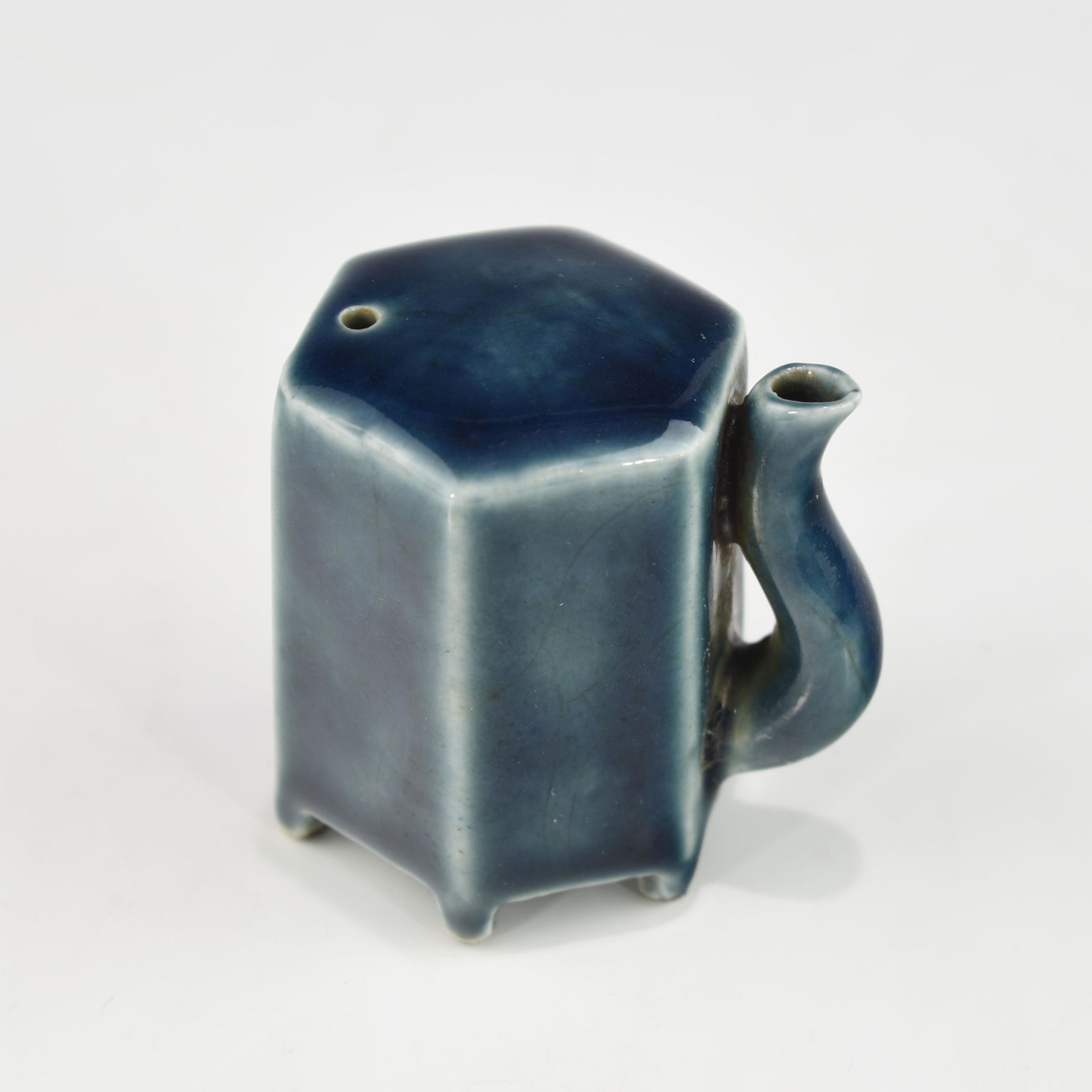 A QING DYNASTY MONOCHROME BLUE GLAZED WATER DROPPER (1 of 4)
