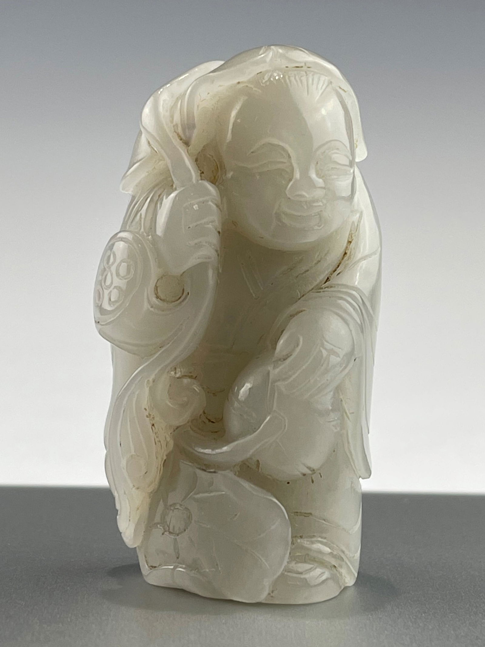 A 19/20TH CENTURY CHINESE PALE CELADON JADE BOY (1 of 6)