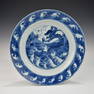 A LARGE CHINESE KANGXI PERIOD CARP AND DRAGON BLUE AND WHITE PORCELAIN PLATE