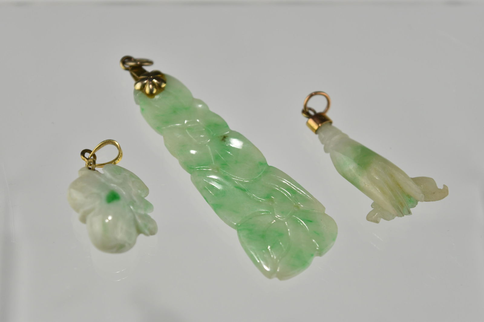 THREE CHINESE JADEITE PENDANTS (1 of 4)