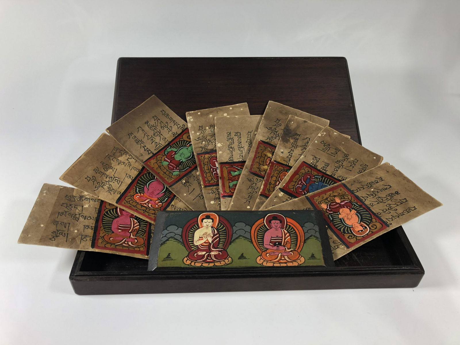 A CHINESE QING TIBETAN BUDDHA'S SUTRA IN AN ANTIQUE ROSEWOOD DOCUMENT BOX (1 of 6)