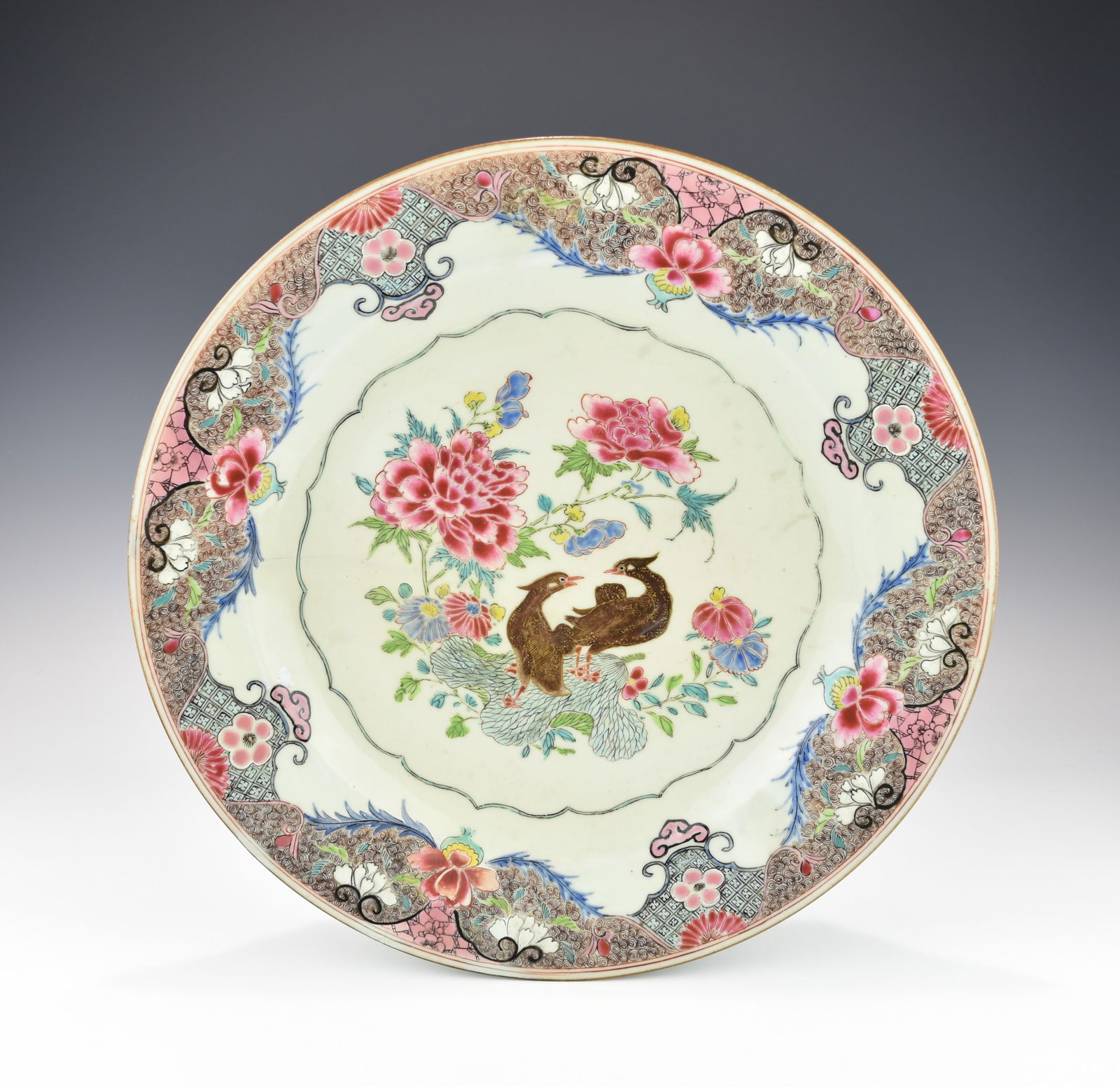 A LARGE CHINESE YONGZHENG FAMILLE ROSE PORCELAIN CHARGER (1 of 3)