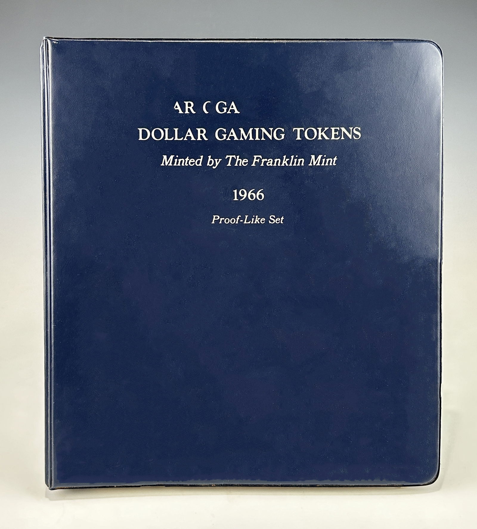 A LIMITED EDITION 1966 FRANKLIN MINT DOLLAR GAMING TOKEN SET (1 of 8)