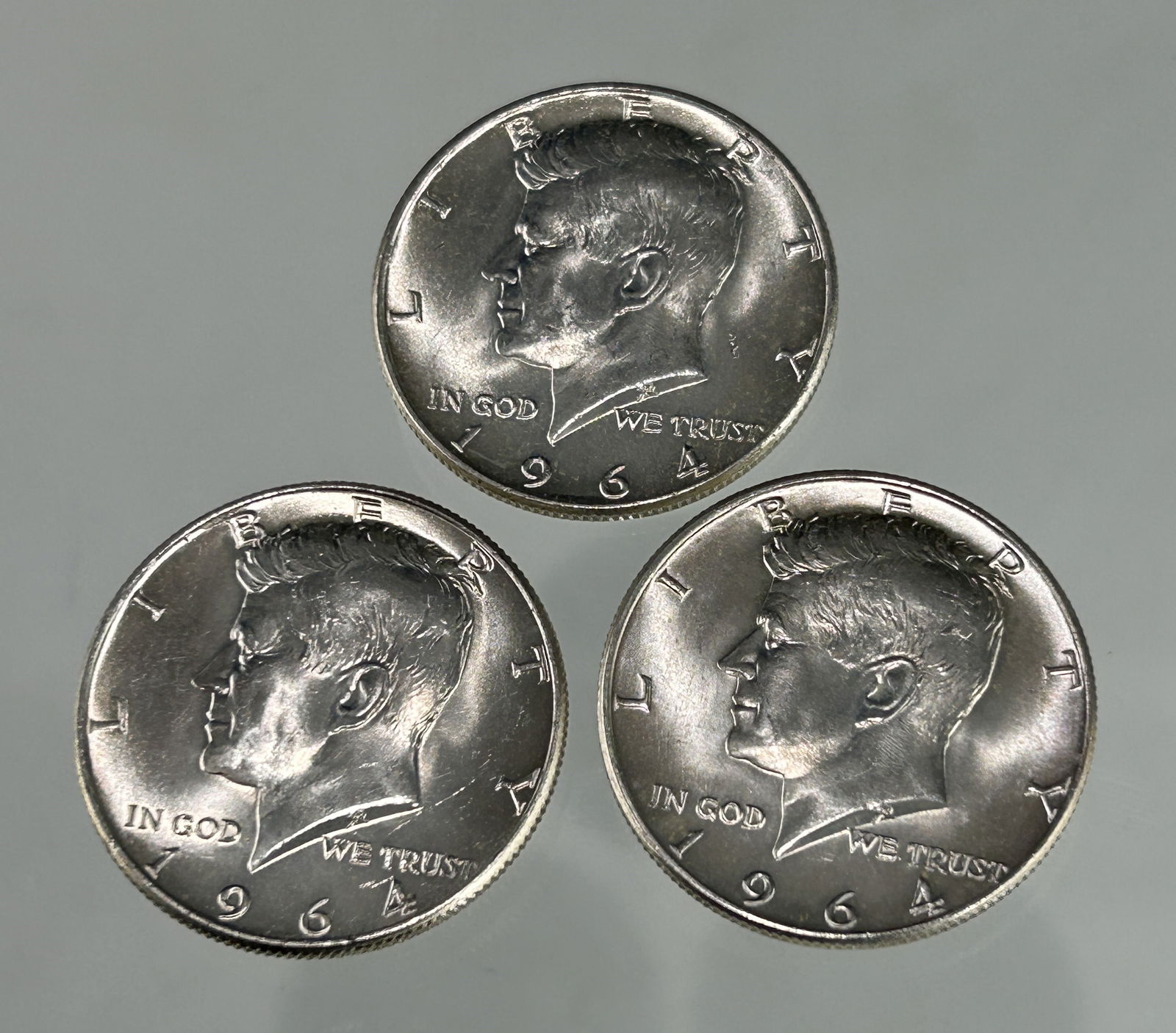 THREE 1964 KENNEDY HALF DOLLARS - 90% SILVER, NEAR-UNCIRCULATED (1 of 3)
