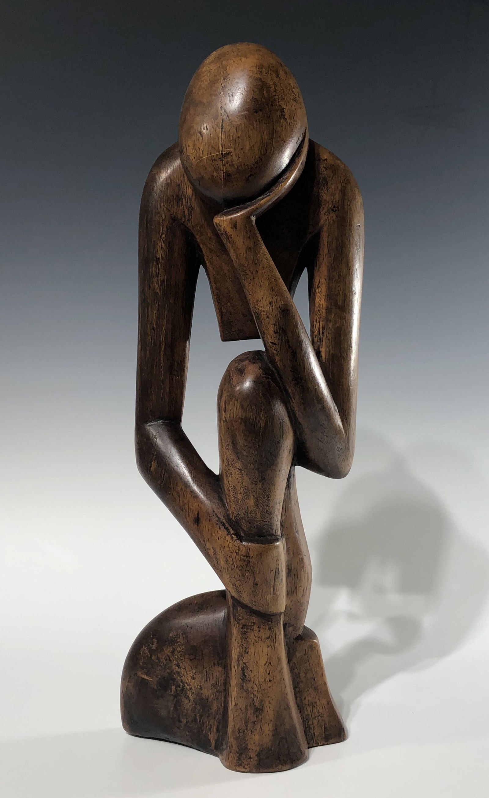 MID-CENTURY HAND-CARVED WOODEN SCULPTURE OF A CONTEMPLATIVE THINKING FIGURE (1 of 5)