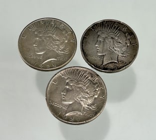 THREE U.S. PEACE SILVER DOLLARS, 1921–1923