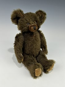 VINTAGE MOHAIR TEDDY BEAR WITH JOINTED LIMBS AND DISTINCTIVE SNOUT