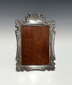 ANTIQUE STERLING SILVER AND WOOD EASEL-BACK PICTURE FRAME