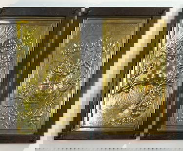 PAIR OF EMBOSSED BRASS BIRD WALL PANELS IN WOOD FRAMES, CIRCA 1870: Each featuring an embossed brass plaque mounted in dark-stained wood frame. One panel depicts a finely detailed owl perched among oak leaves and acorns against a textured background, while the other s