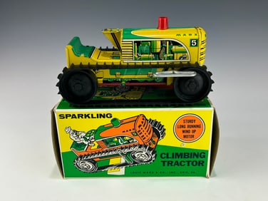 A 1950'S MARX NO. 5 CLIMBING TRACTOR SPARKLING WINDUP TOY IN ORIGINAL BOX
