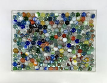 A JAR OF VINTAGE GLASS MARBLES