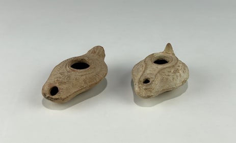 TWO ANCIENT ROMAN TERRACOTTA OIL LAMPS