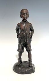 ARTIST SIGNED FIGURAL STATUE OF A BOY