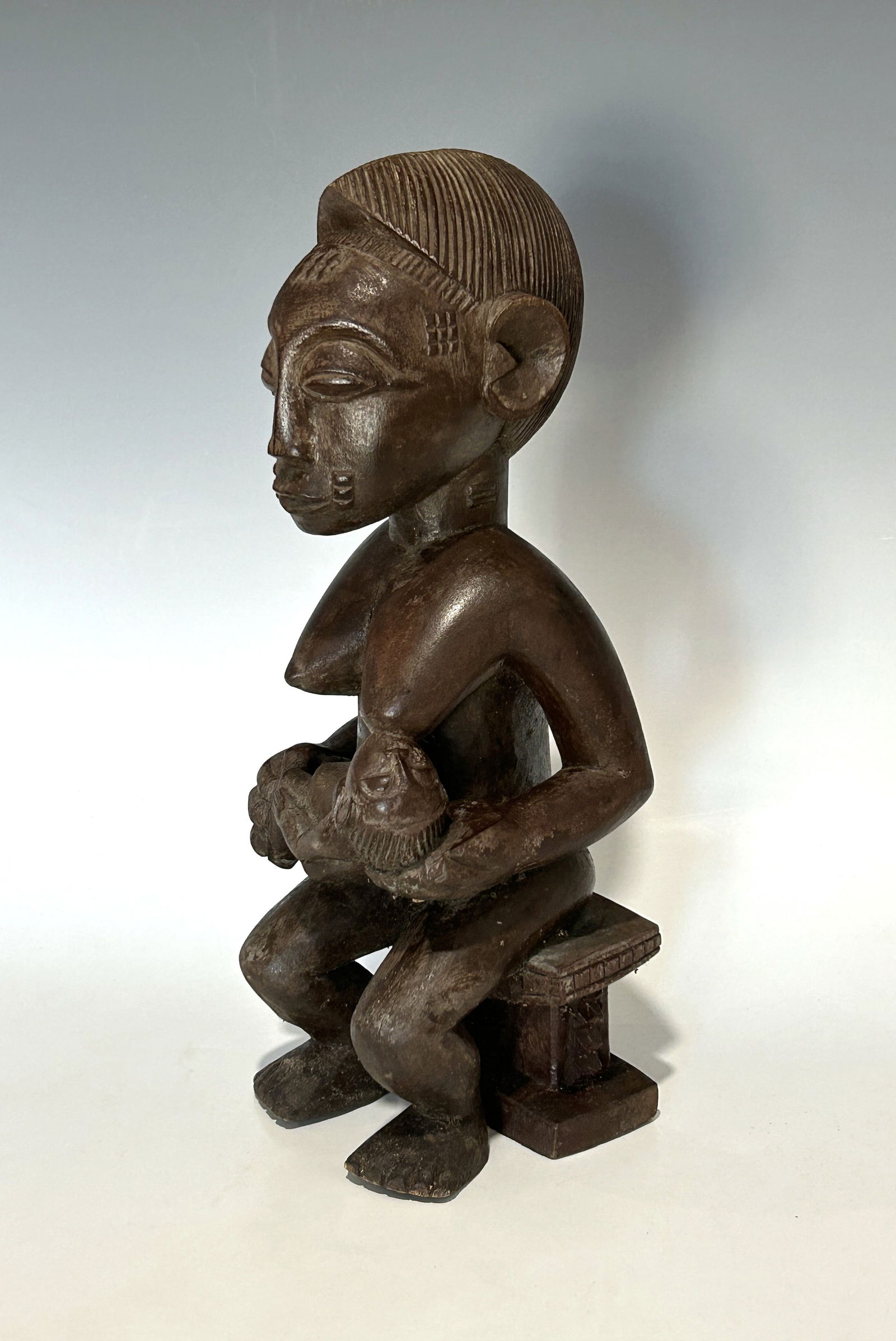 BAULE MATERNITY FIGURE, CÔTE D’IVOIRE, MID-CENTURY OR EARLIER (1 of 6)