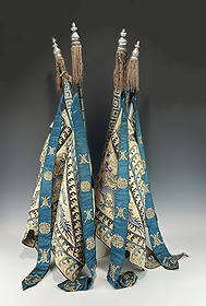 RARE CHINESE QING DYNASTY SILK EMBROIDERED MILITARY DRAGON FLAGS: 19th century or older. Four rare triangular ivory ground silk embroidered flags with blue five-clawed imperial dragon chasing the flaming pearl in flight amid auspicious clouds and flames, rendered in