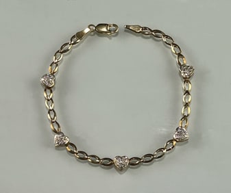 CHARMING VINTAGE 14K YELLOW GOLD AND DIAMOND HEART-LINK BRACELET