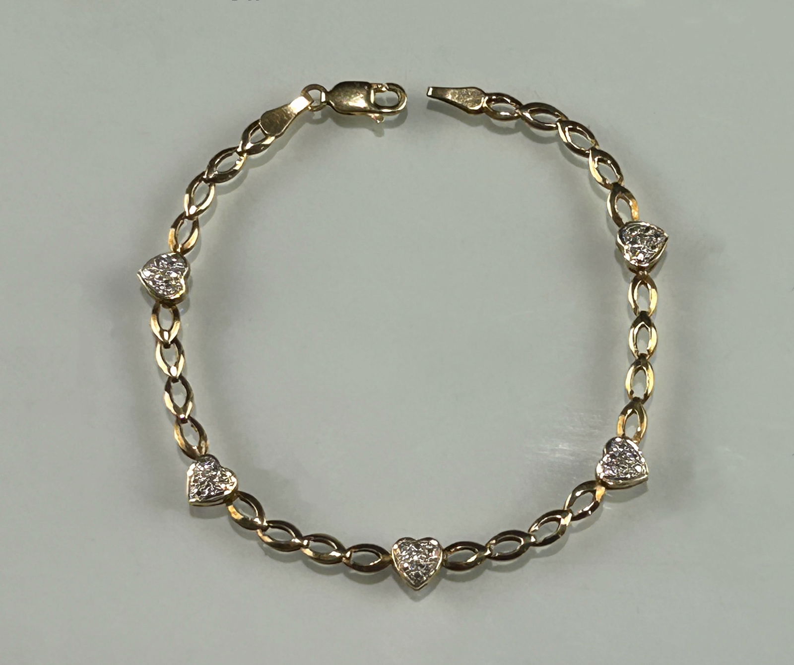 CHARMING VINTAGE 14K YELLOW GOLD AND DIAMOND HEART-LINK BRACELET (1 of 4)