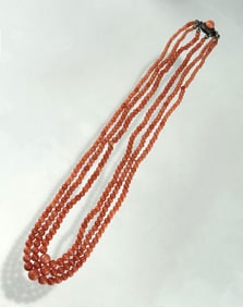 THREE-STRAND CORAL NECKLACE WITH ORNATE CLASP