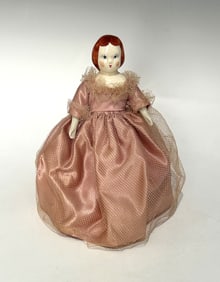 VINTAGE PORCELAIN DOLL IN PINK SATIN DRESS
