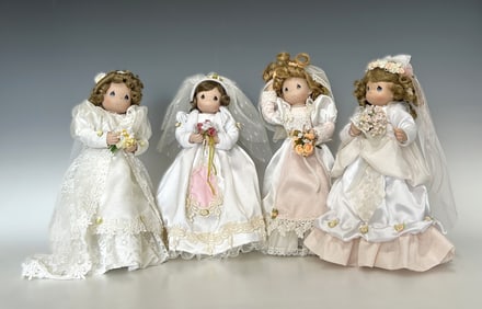 FOUR PRECIOUS MOMENTS-STYLE BRIDE DOLLS, LATE 20TH CENTURY