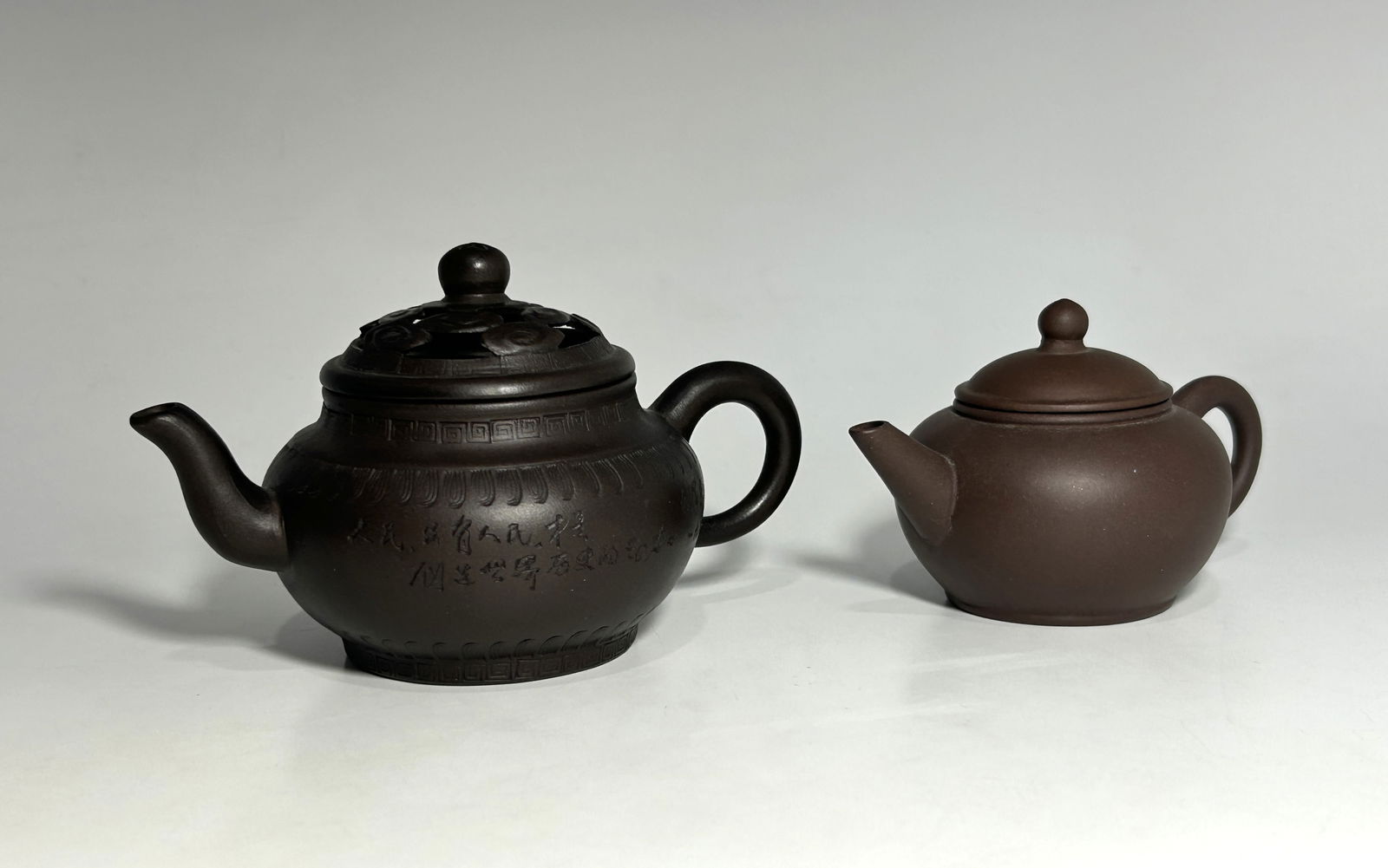 TWO VINTAGE CHINESE YIXIN ZISHA TEAPOTS (1 of 8)