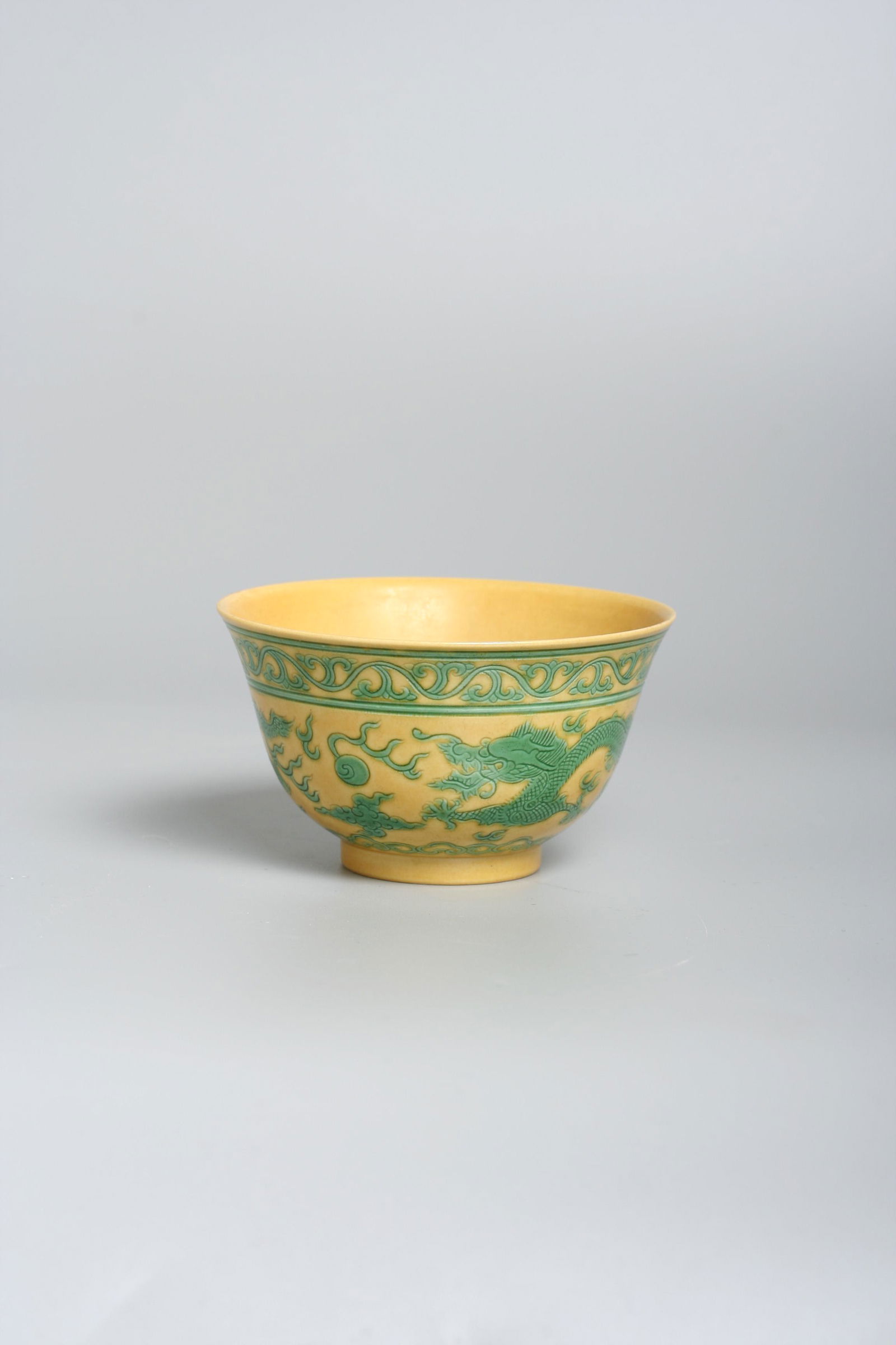 A Chinese porcelain yellow dragon bowl, Dagouang: A Chinese porcelain dragon bowl, Dagouang (1820 - 1850), Beautiful yellow and green imperial dragon, Official Kiln. Marked with underglazed Daoguang seal mark. Diameter 10 cm