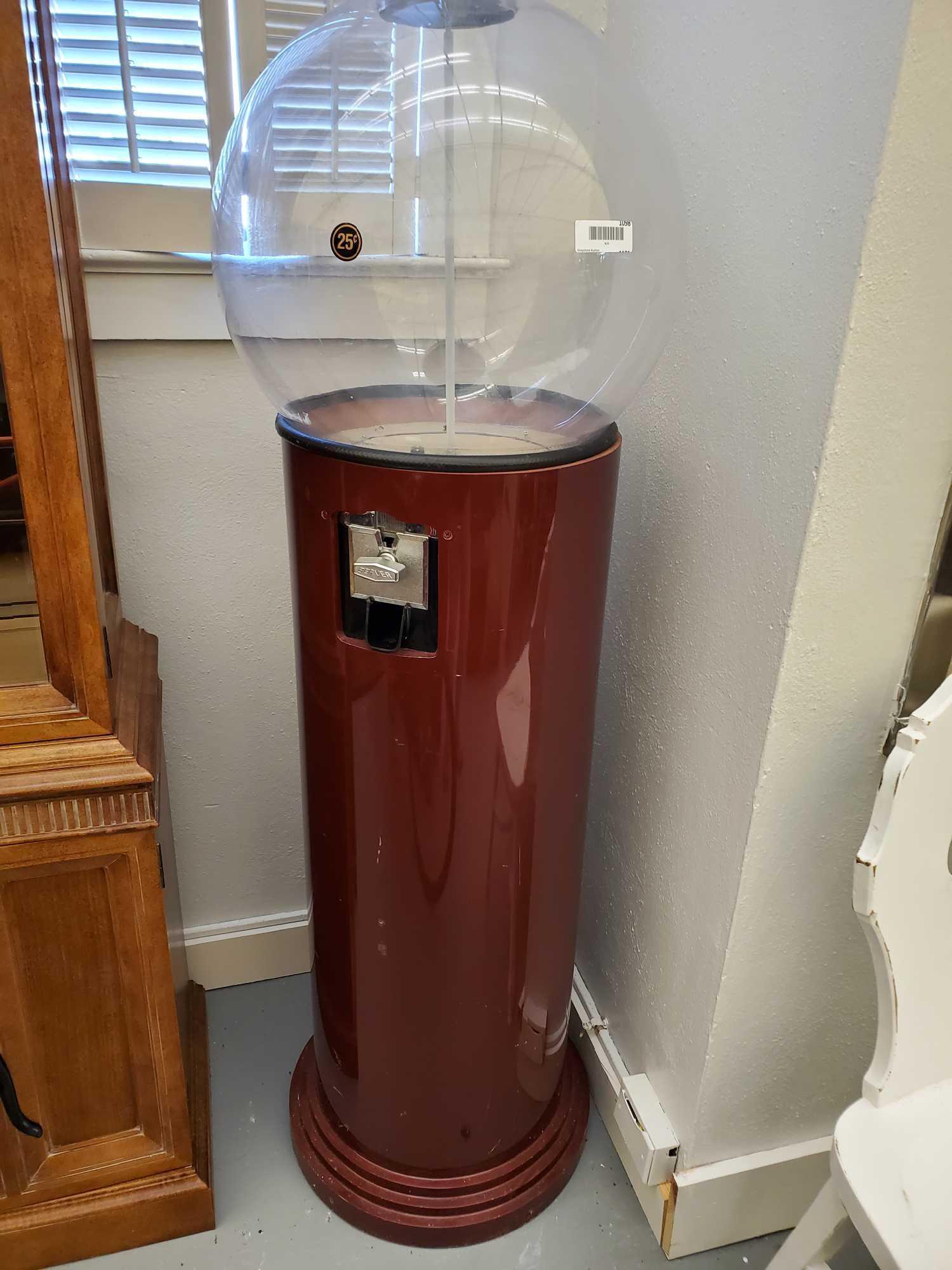 Gum Ball Machine: Gum Ball Machine Measurements: almost 5 feet tall. Uses quarters, I do not have the key has a retro, mid century look too it.