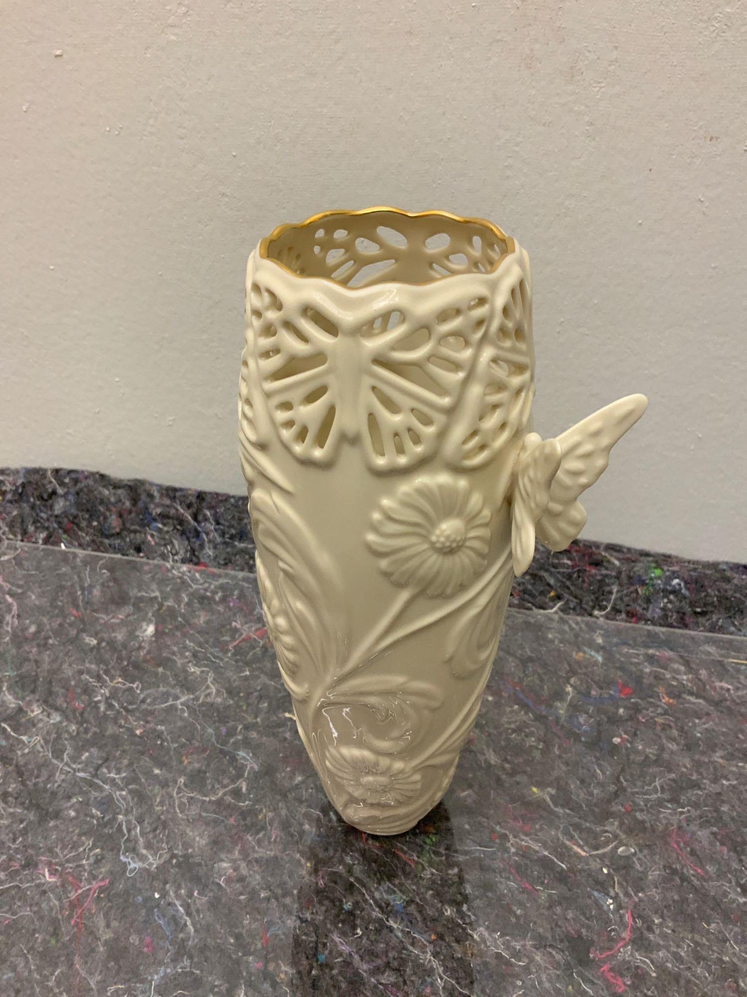Lenox vase: Lenox butterfly and lace bud vase with UPC code still on great condition like new no cracks or chips. Size approximately 9” high