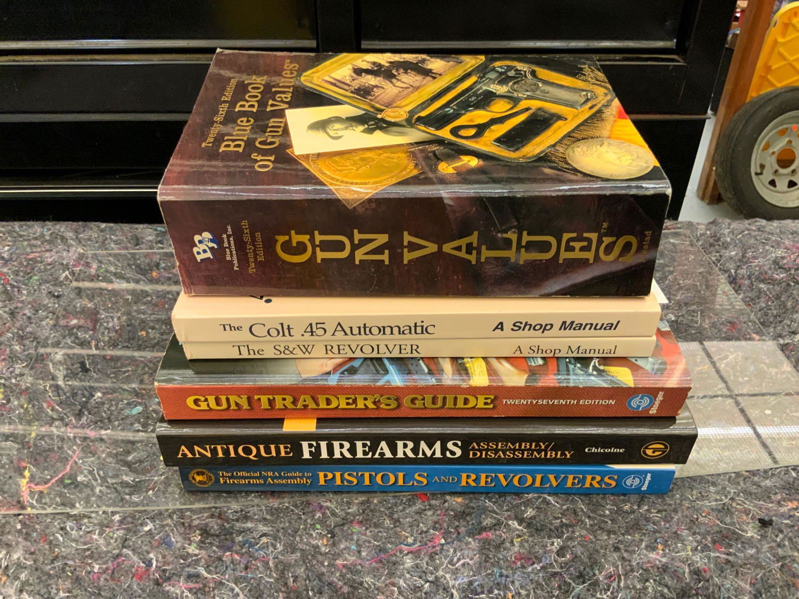 Gun books: Gun books, pistols and revolvers, antique firearms assembly and disassembly, gun traders guide, gun values, 26th edition, the colt 45 automatic shop manual, the Smith & Wesson revolver shop manual,