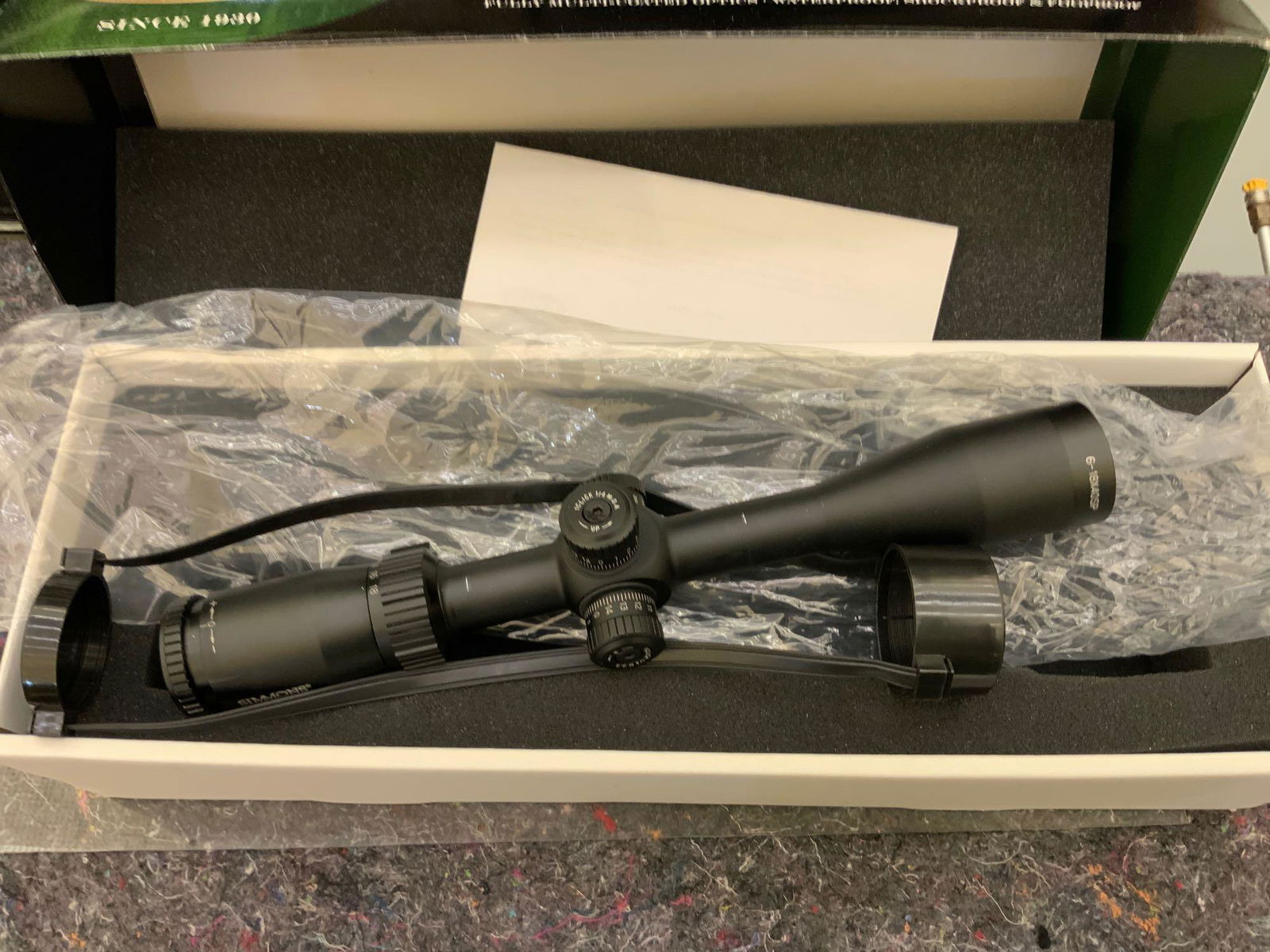 Weaver T-series  box with a Simmons scope (1 of 4)