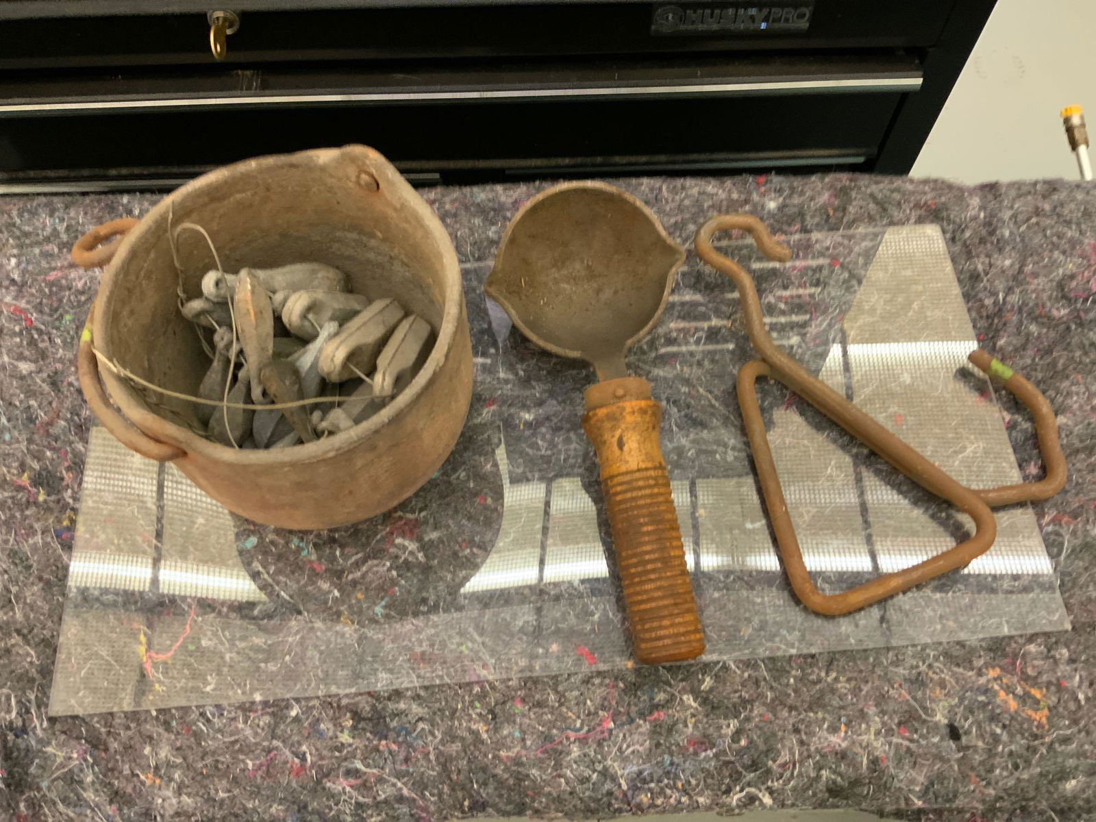 Lead cooking pot with ladle and holder. (1 of 2)