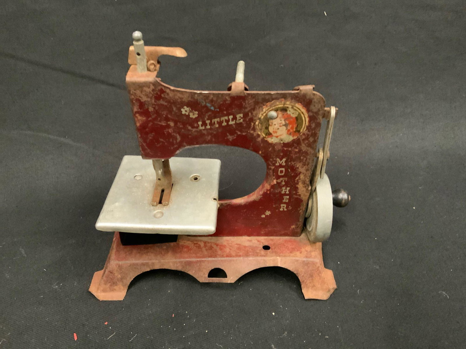 Artcraft metal products inc: Play sewing machine, little mother, does work, all mechanical. Made it in West Haven Connecticut USA no box only small toy sewing machine.