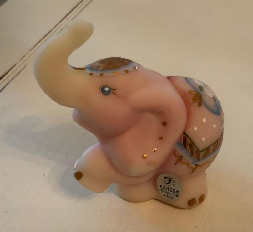 Fenton: Fenton hand painted elephant, maybe approximately 4 inches high by 4 inches wide no cracks or chips, still with the Fenton tag!