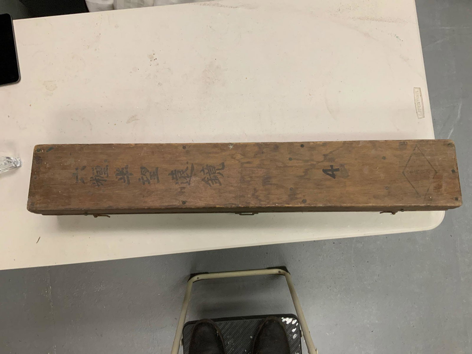 World War II Japanese shell box with a survey: World War II Japanese shell box with a survey instrument, inside, it has Japanese writing inside and outside a box. The lenses are in great condition etched into the instrument NO 50738 Ross and Londo