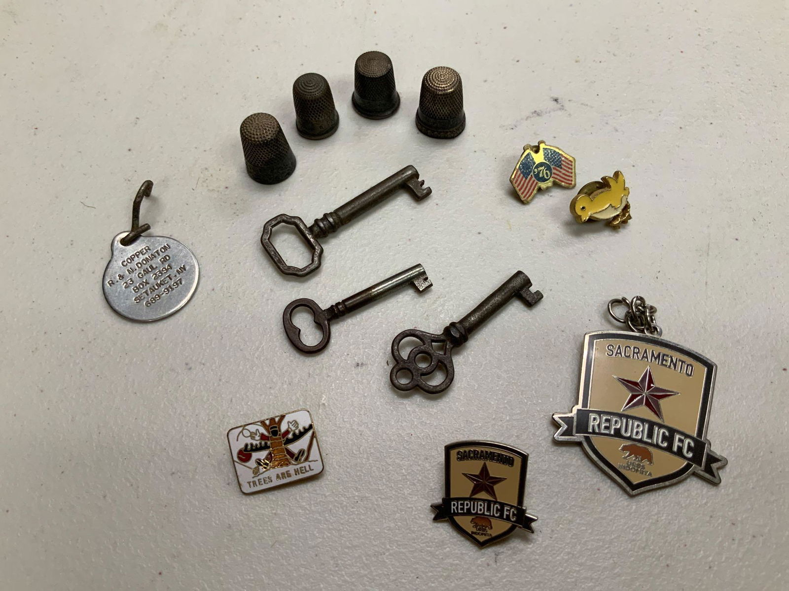 Antique miniature set of keys and symbols pins etc.: Antique miniature set of keys and symbols pins etc. For thimbles three keys four pins and two keychain, some of the symbols look like they’re silver? All one lot....