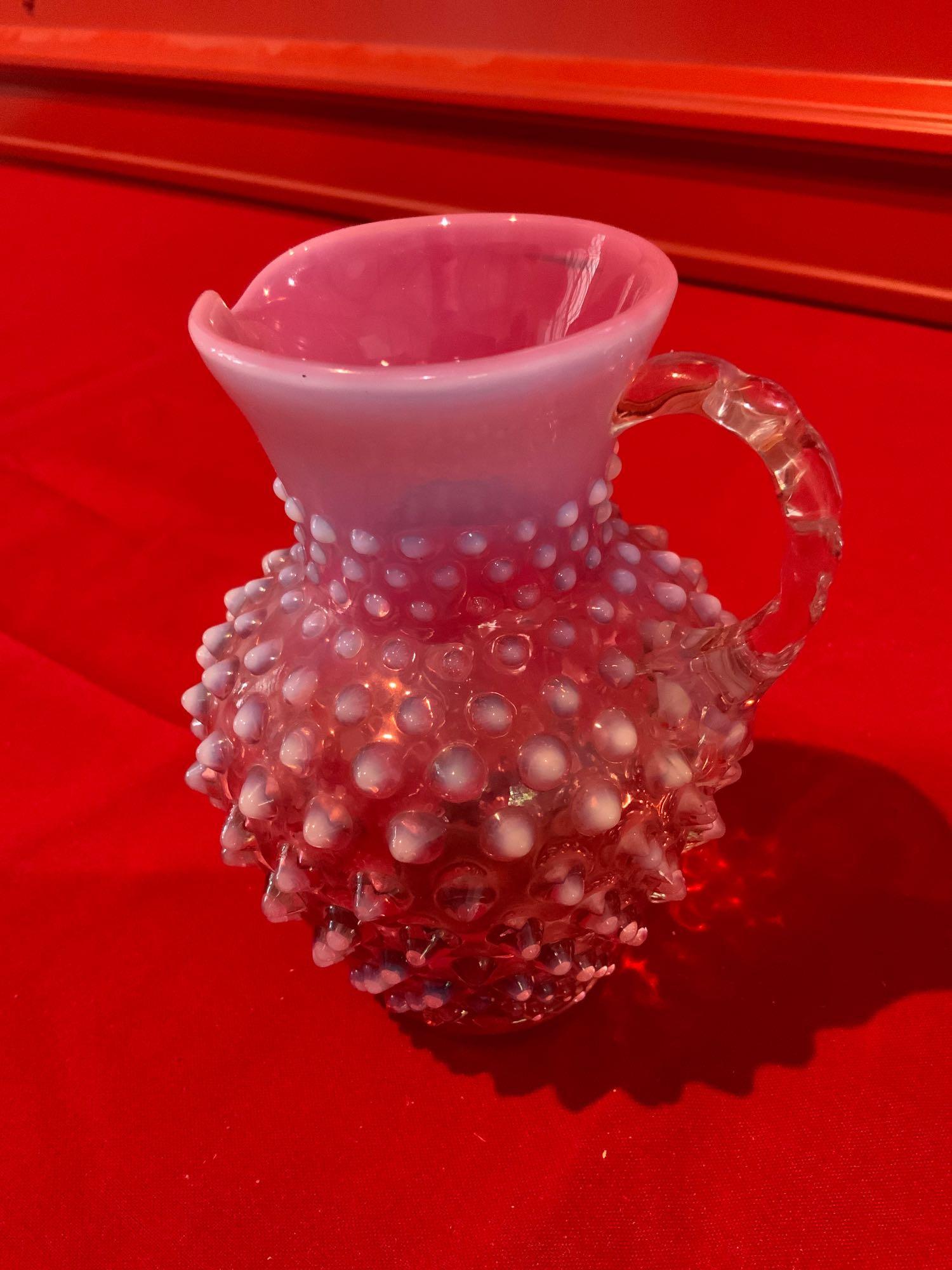 Fenton, Cranberry opalescent hobnail picher: Fenton, Cranberry opalescent hobnail picher, size, 6 inches tall no chips or cracks in great condition