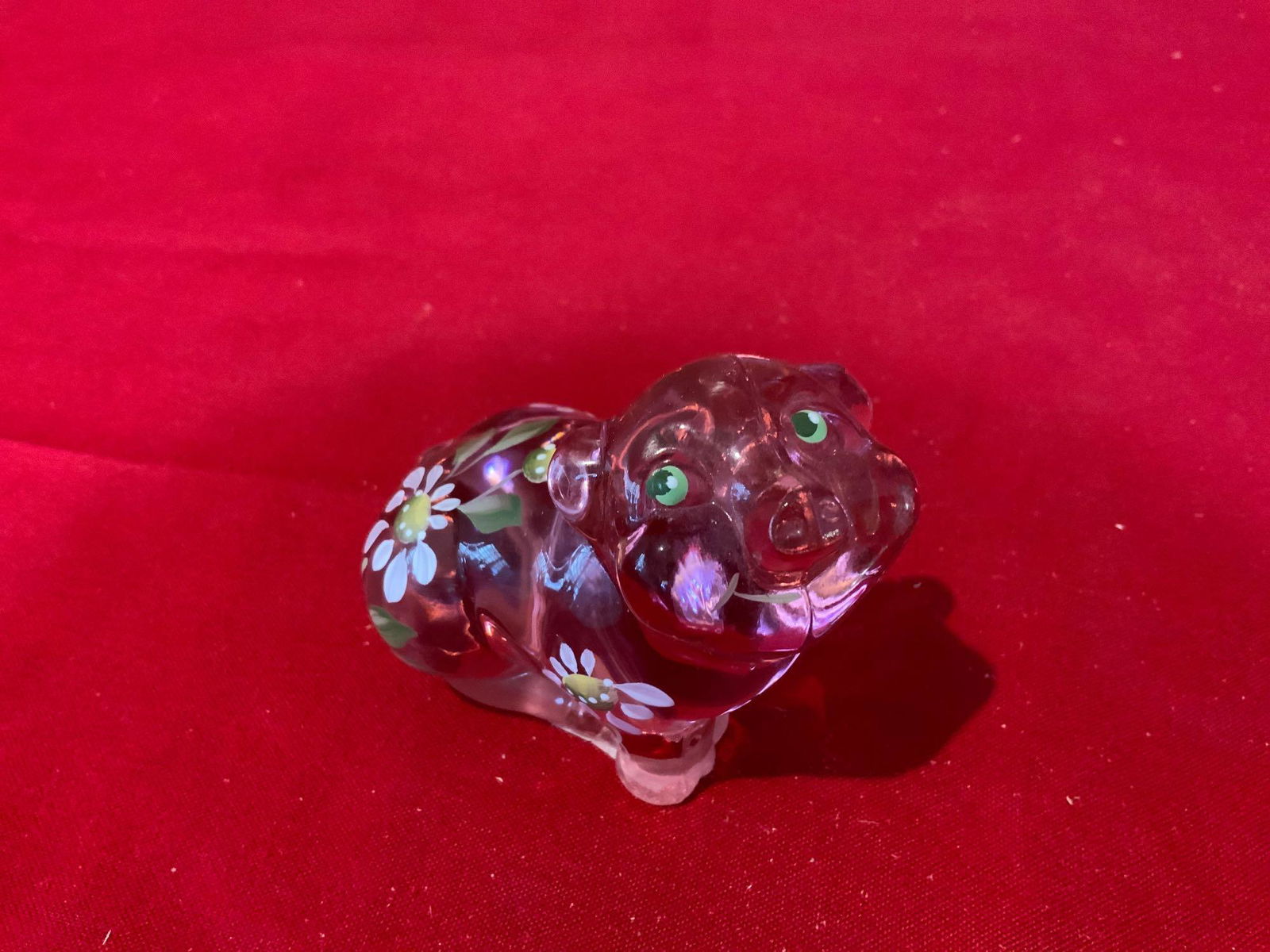 Fenton pink glass pig signed by the artist. (1 of 4)
