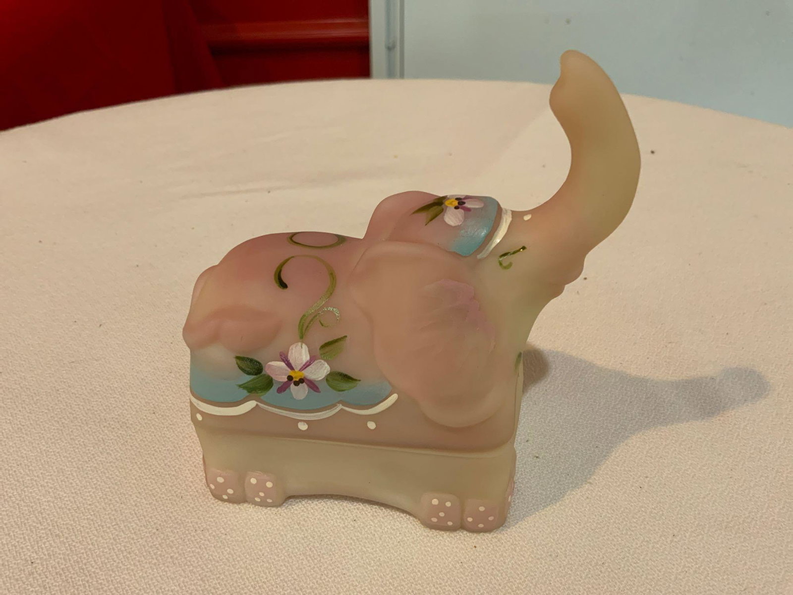 Fenton, Burmese elephant trinket jar, hand painted and: Fenton, Burmese elephant trinket jar, hand painted and signed by the artist, approximately 4 inches tall, in great condition no chips or cracks
