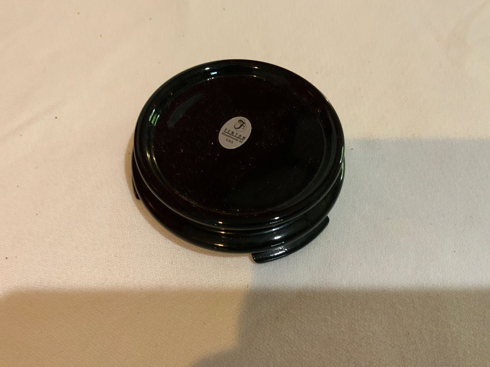 Fenton, Black opal stand: Fenton, Black opal stand, In great condition no chips or cracks 1 1/4 inches tall by 4 inches round