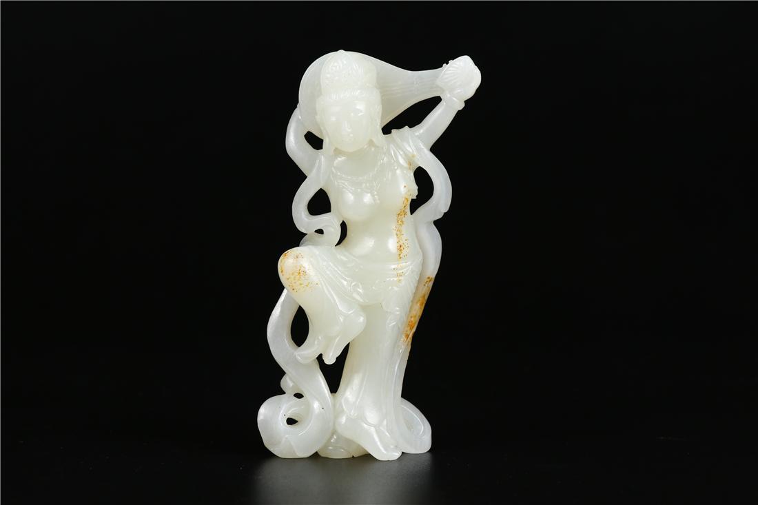 A HETIAN JADE INSTRUMENT PLAYING STATUE (1 of 6)