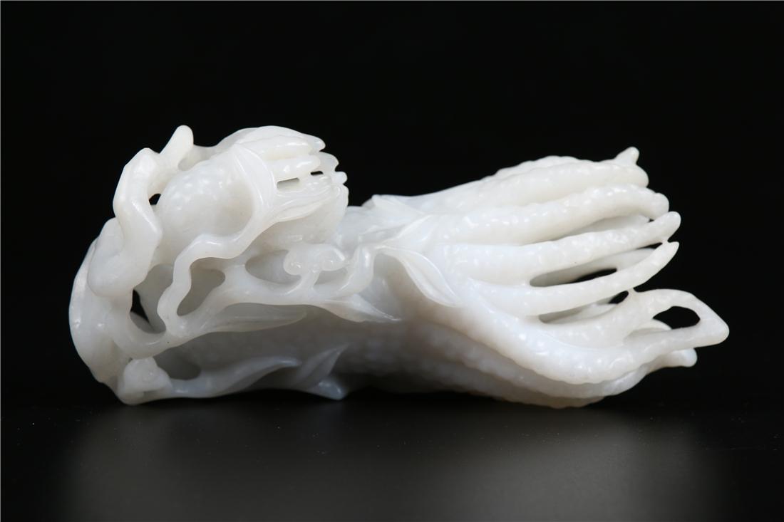 A HETIAN JADE BUDDHA HAND STATUE (1 of 9)