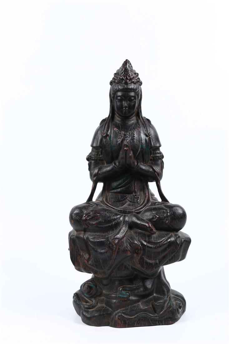 A ROSEWOOD GUANYIN STATUE (1 of 12)