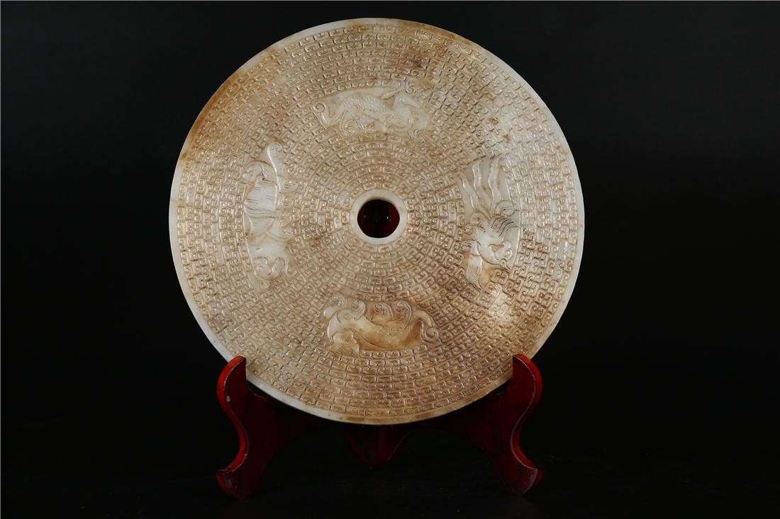 A HETIAN JADE BI WITH PATTERN (1 of 9)