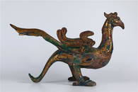 A GILT BRONZE PHOENIX SCULPTURE, TANG DYN.