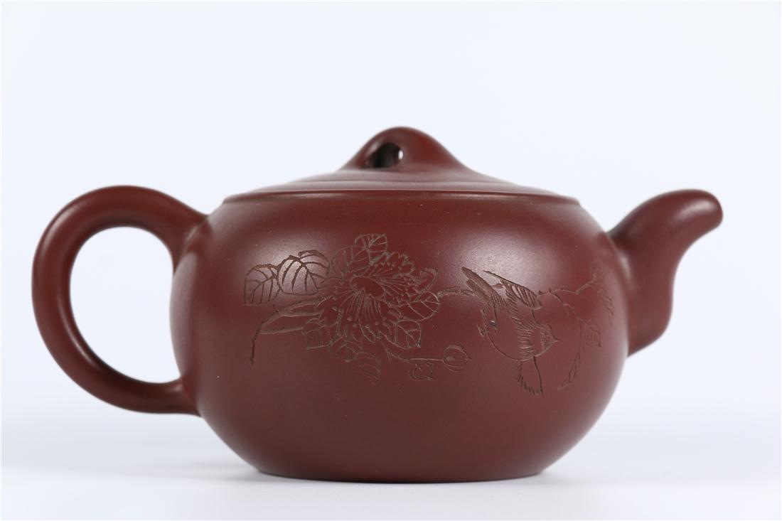 A PURPLE CLAY TEAPOT (1 of 9)