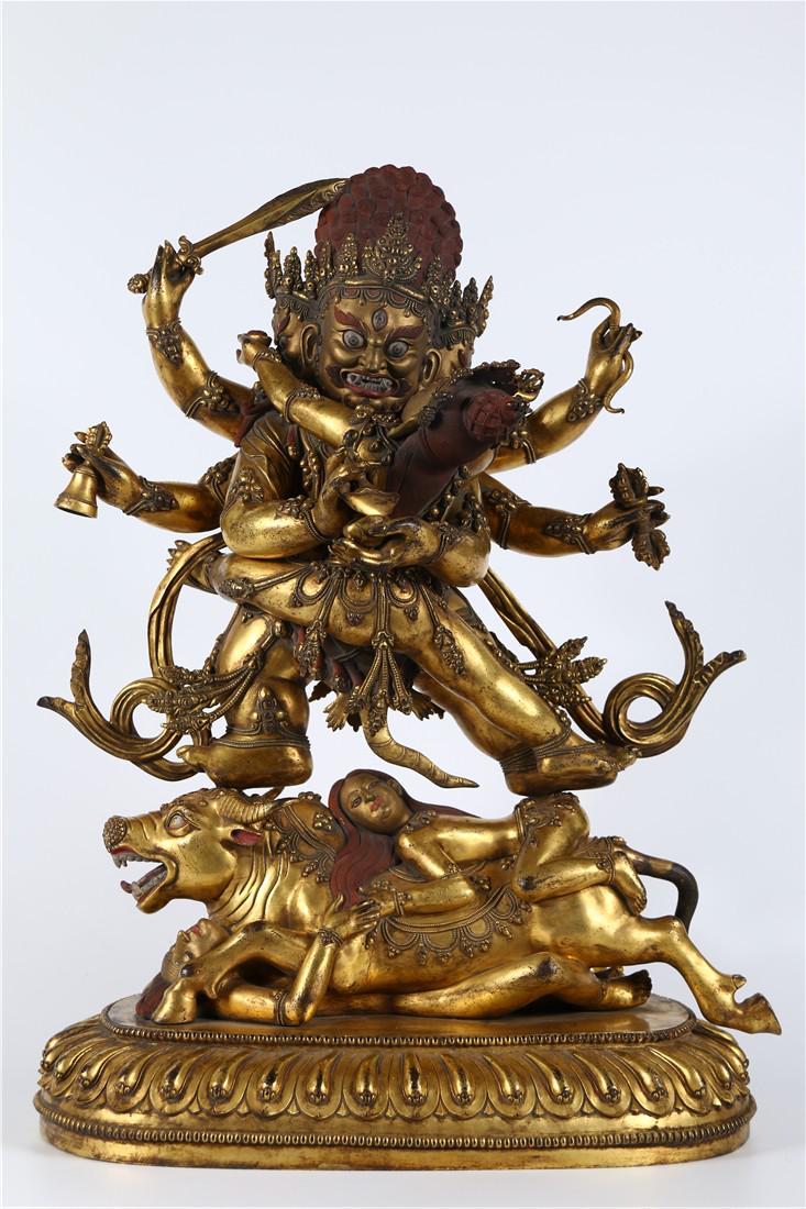 A GILT BRONZE STATUE OF HEAVENLY BUDDHA MOLI (1 of 9)